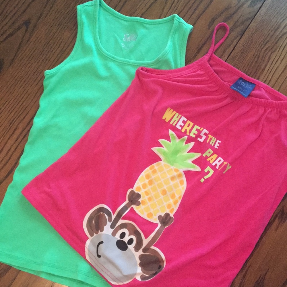 Size 10 girls shirts. 2 shirts, 1 pink, 1 green